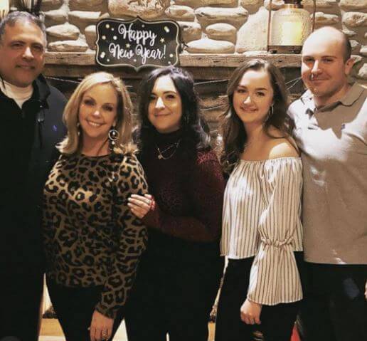 Kelley Dunn with her husband and children.